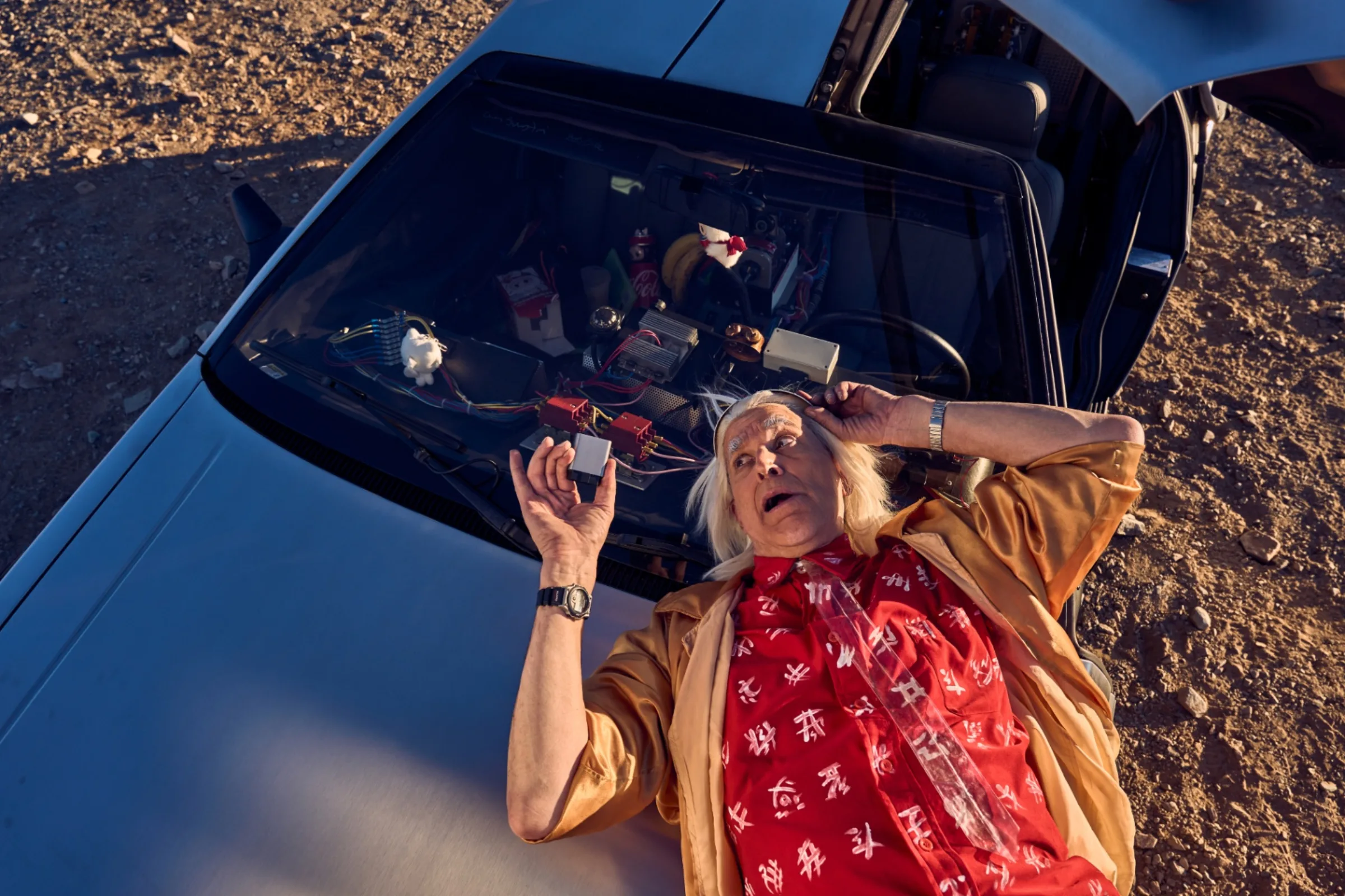 Doc Brown beside the DeLorean — SPARQ brings you the future